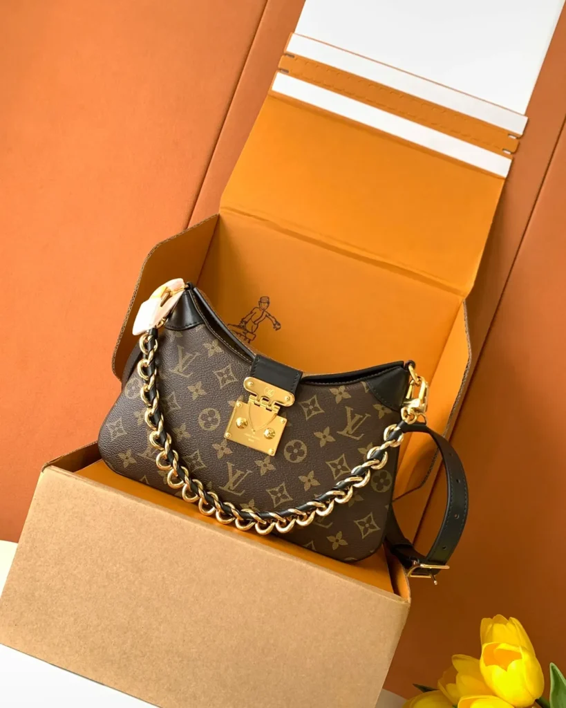 Brown Monogram Curved Shoulder Bag with Chain — angled front view