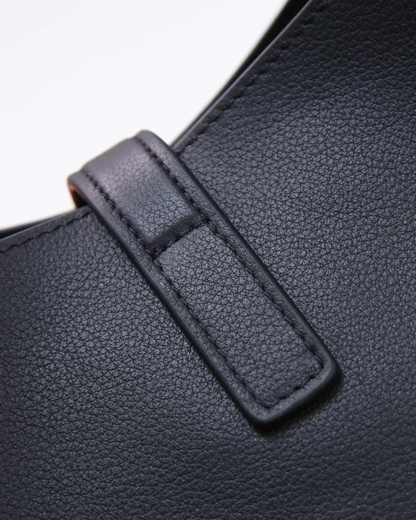 Black Curved-Top Shoulder Bag — strap detail view