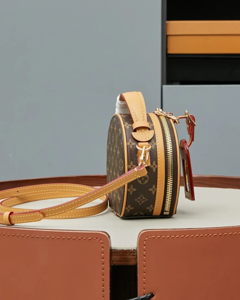 Brown Monogram Round Crossbody Bag — side view