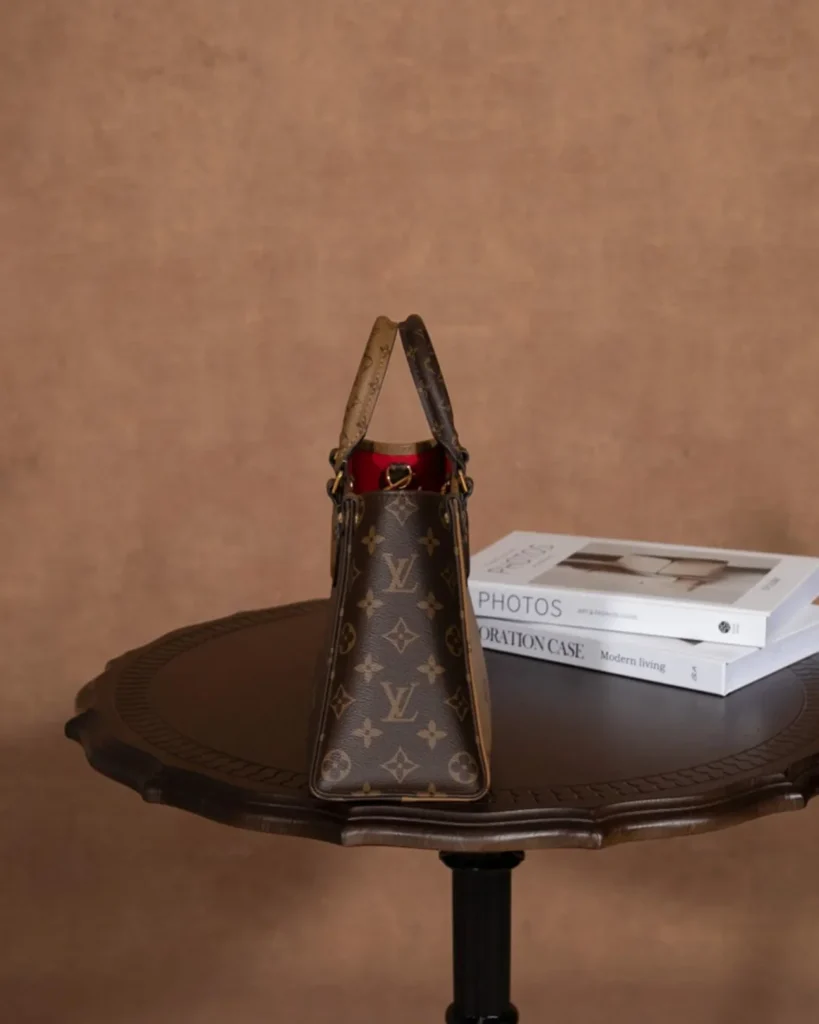Brown Giant Monogram Tote with Round Pouch — side view