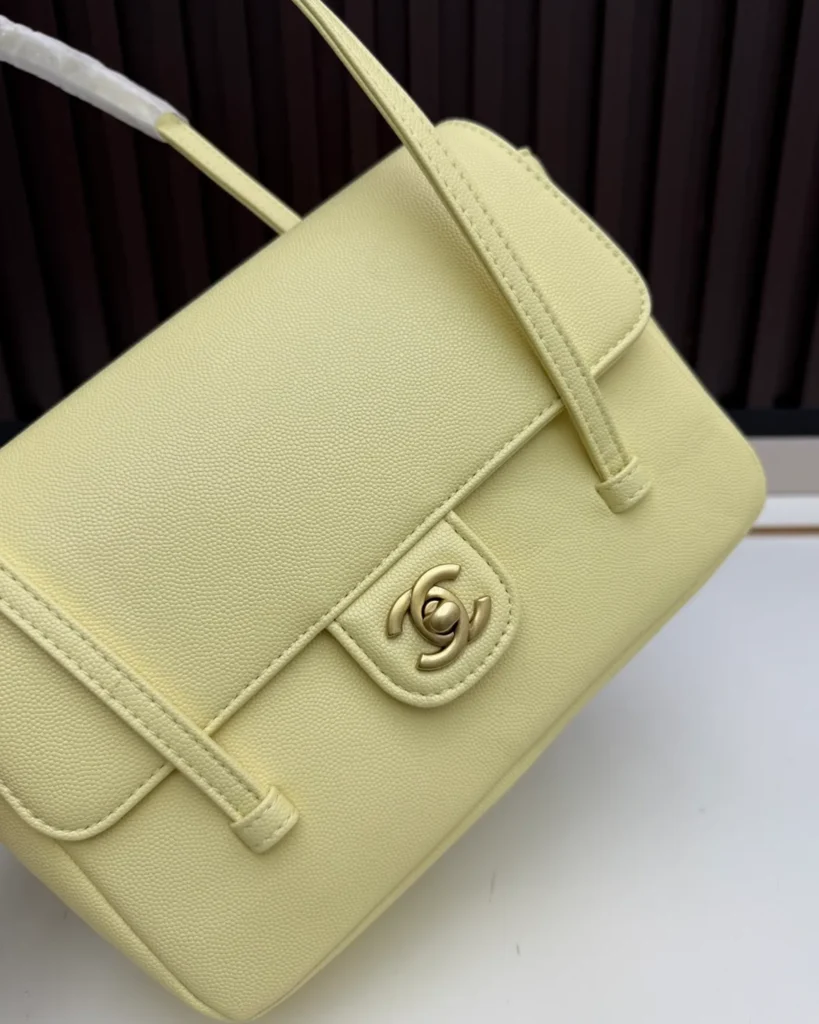 Pale Yellow Long-Handle Flap Bag — close front view