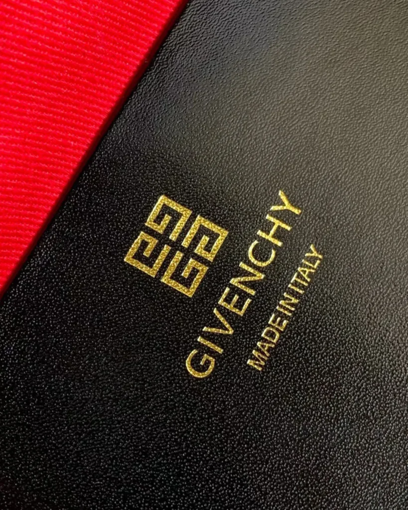Black Red-Lined Twin-Handle Satchel — label detail