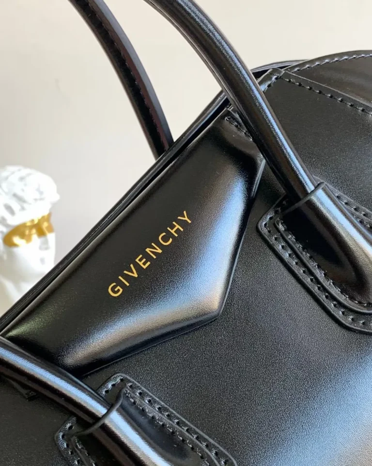 Black Red-Lined Twin-Handle Satchel — logo detail