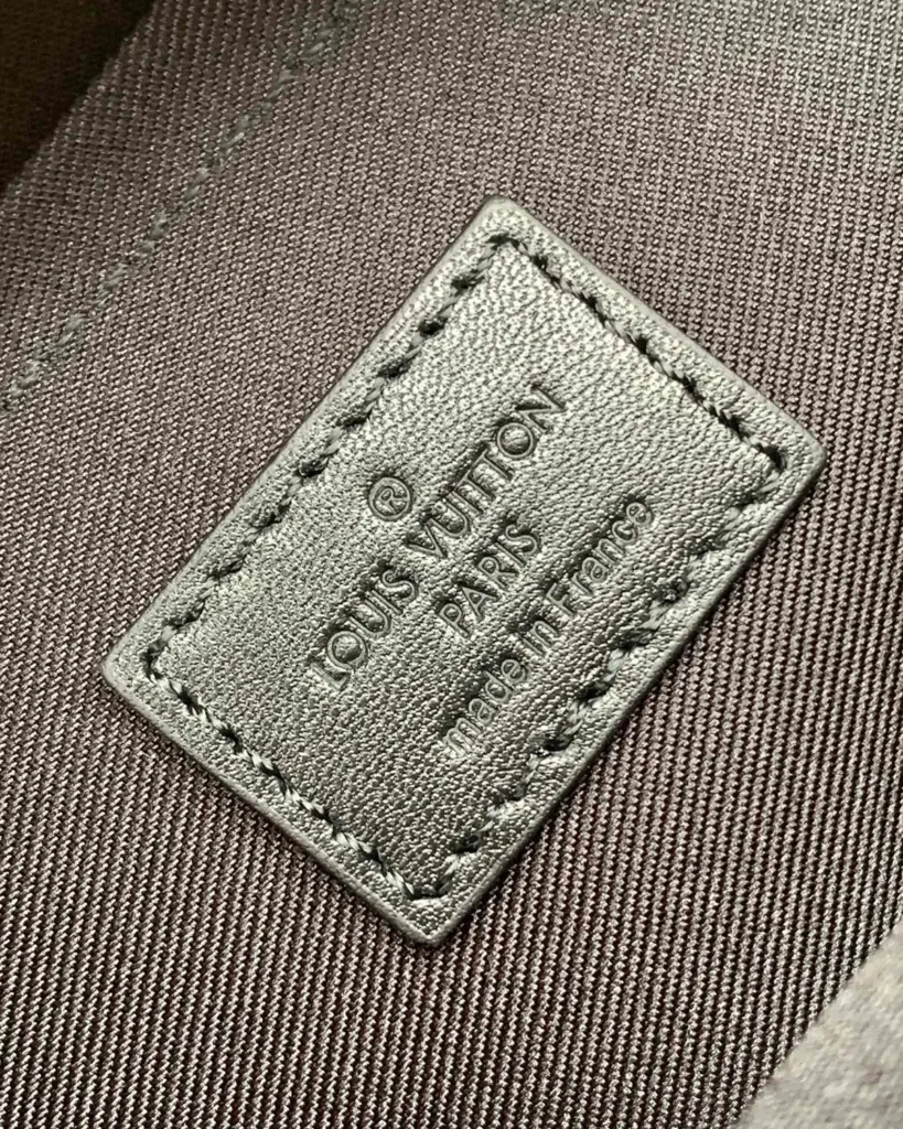 Brown Monogram Black-Trim Messenger Bag — interior label view