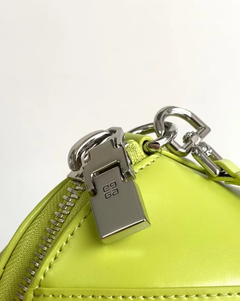 Lime Green Architectural Top Handle Bag — zip detail view