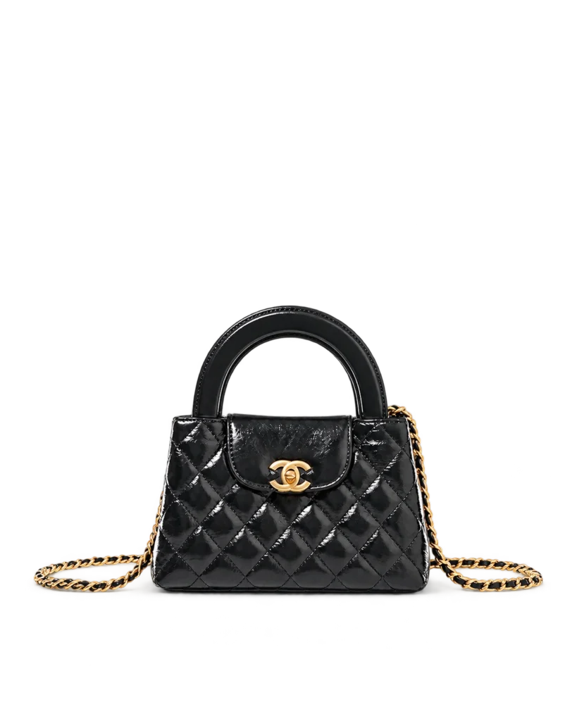 Black Quilted Tab-Flap Top-Handle Bag — upright front view
