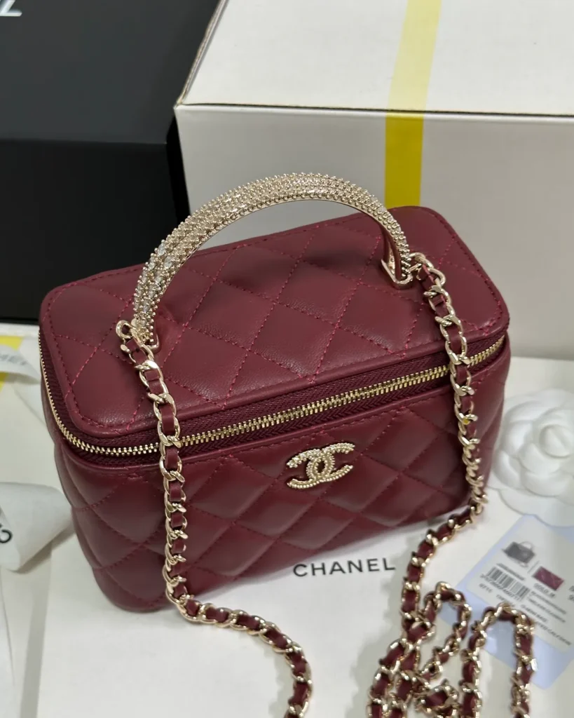 Burgundy Quilted Ornamental-Handle Vanity Bag — top front view