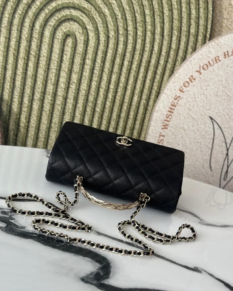 Black Quilted Metal-Handle Flap Bag — top front view