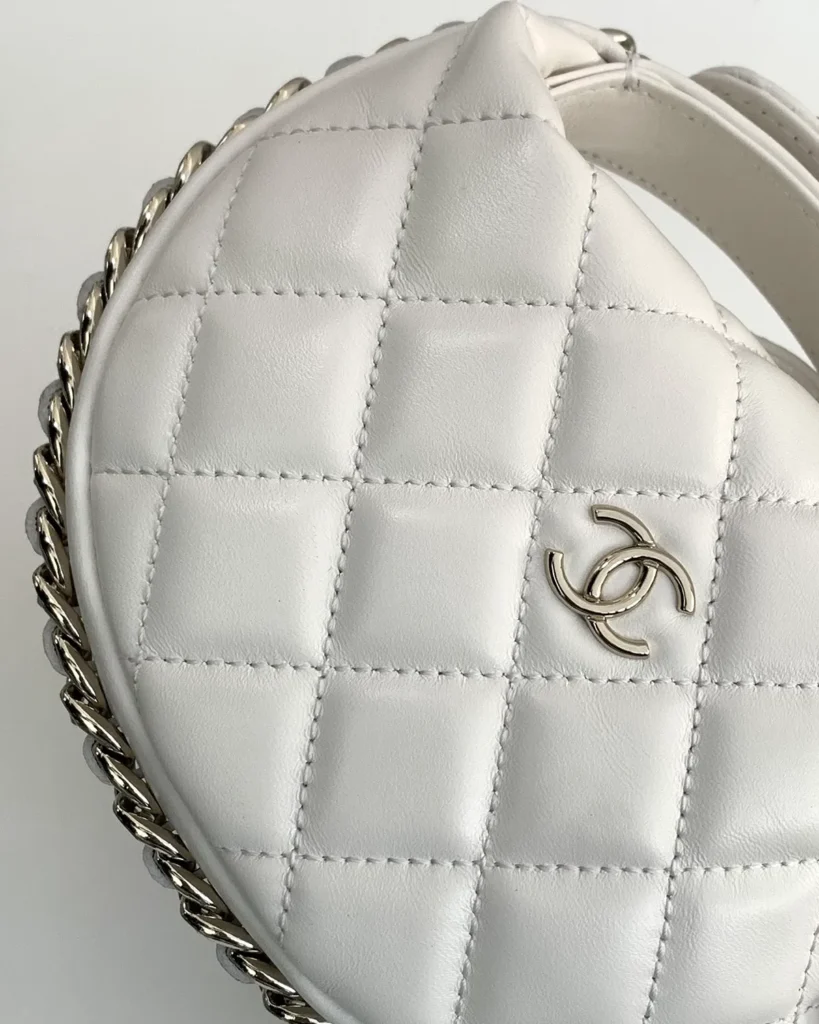 Ivory Quilted Round Chain-Edge Bag — quilt detail view