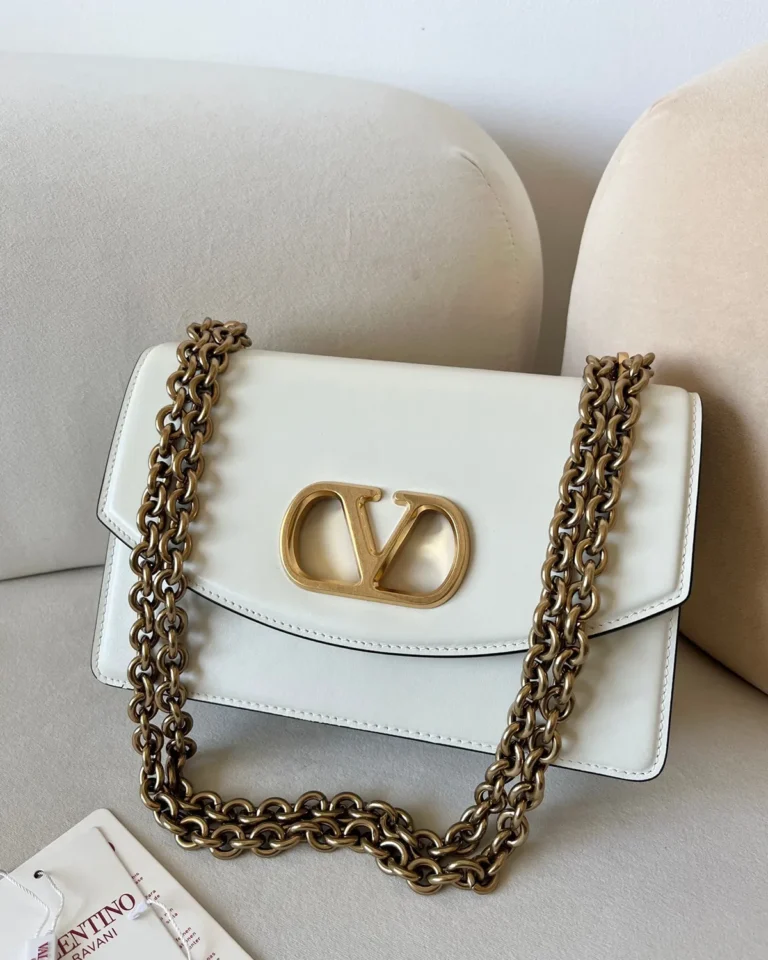 Ivory Curved-Flap Chain Shoulder Bag — front view