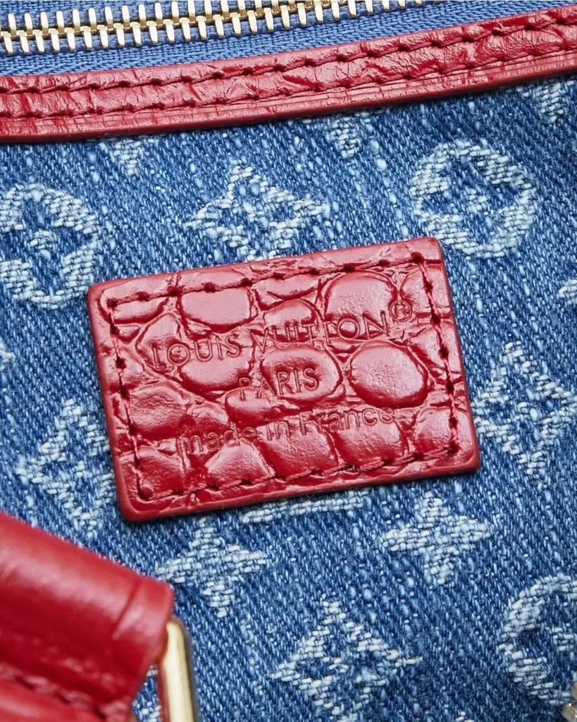 Cherry Denim Blue Speedy-Inspired Handbag — red label detail view