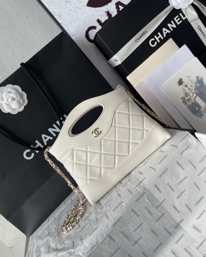 Ivory Quilted Cutout-Handle Tote — angled front view