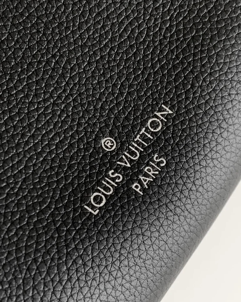 Black Silver-Tone Corner Shoulder Bag — front lettering view