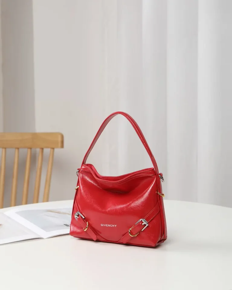 Glossy Red Buckle Shoulder Bag — angled front