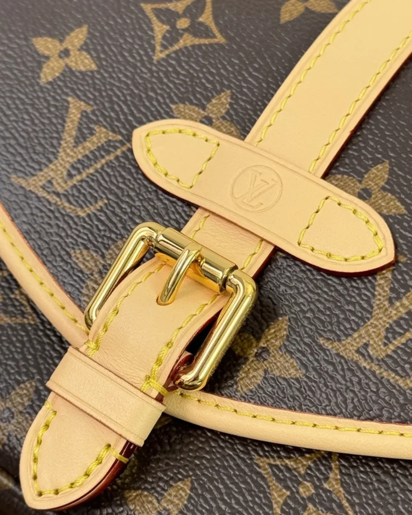 Brown Monogram Tan-Trim Saddle Bag — buckle detail view