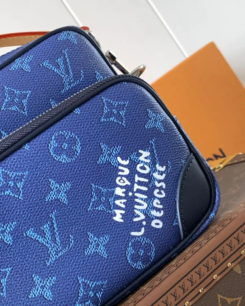 Blue Monogram Dual Zip Camera Bag — pattern lettering view