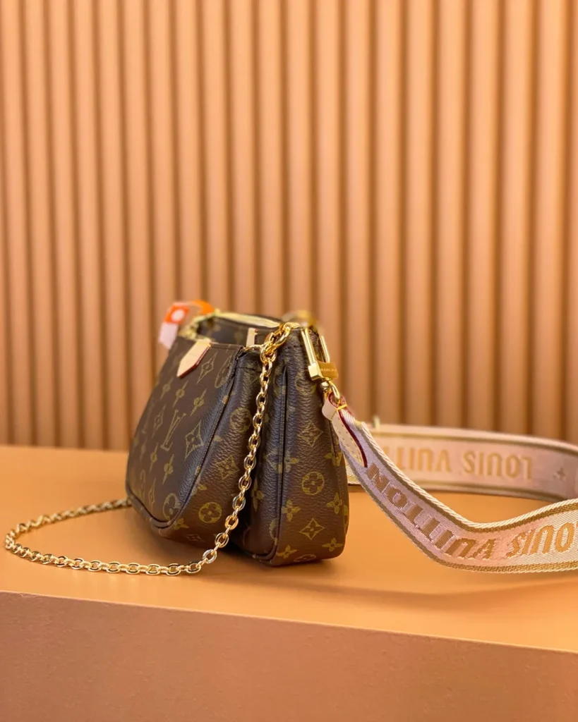 Brown Monogram Multi-Pouch Bag with Pink Strap — side view