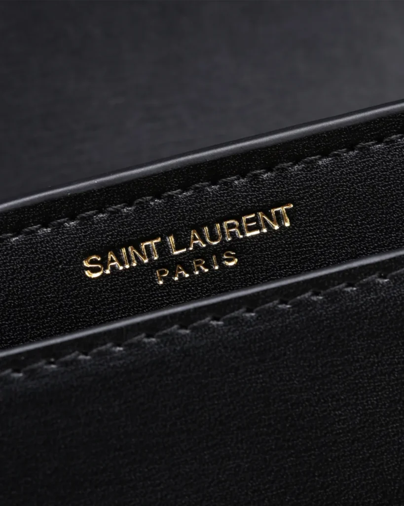 Black Accordion Chain Flap Bag — interior detail view