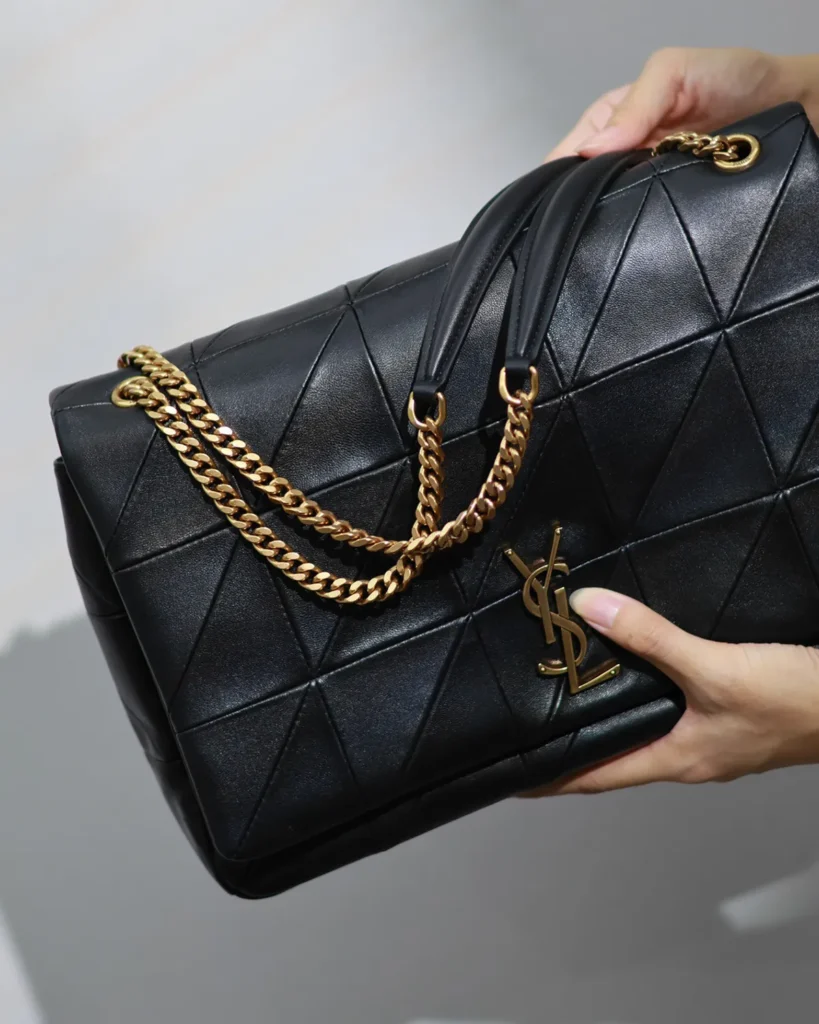Black Geometric Quilted Flap Bag — strap view