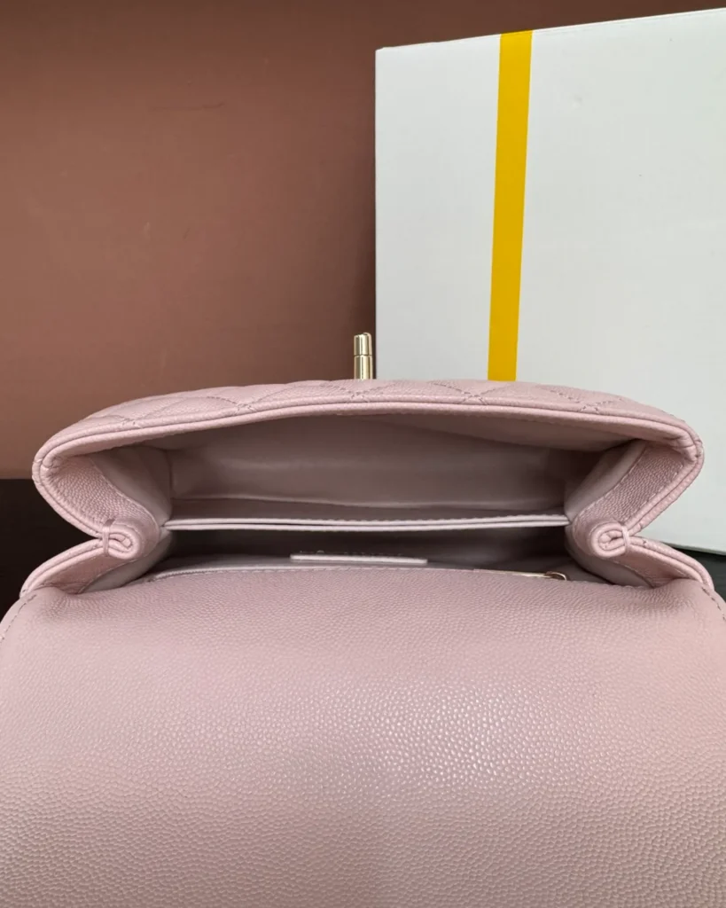 Light Pink Quilted Top-Handle Flap Bag — open top view