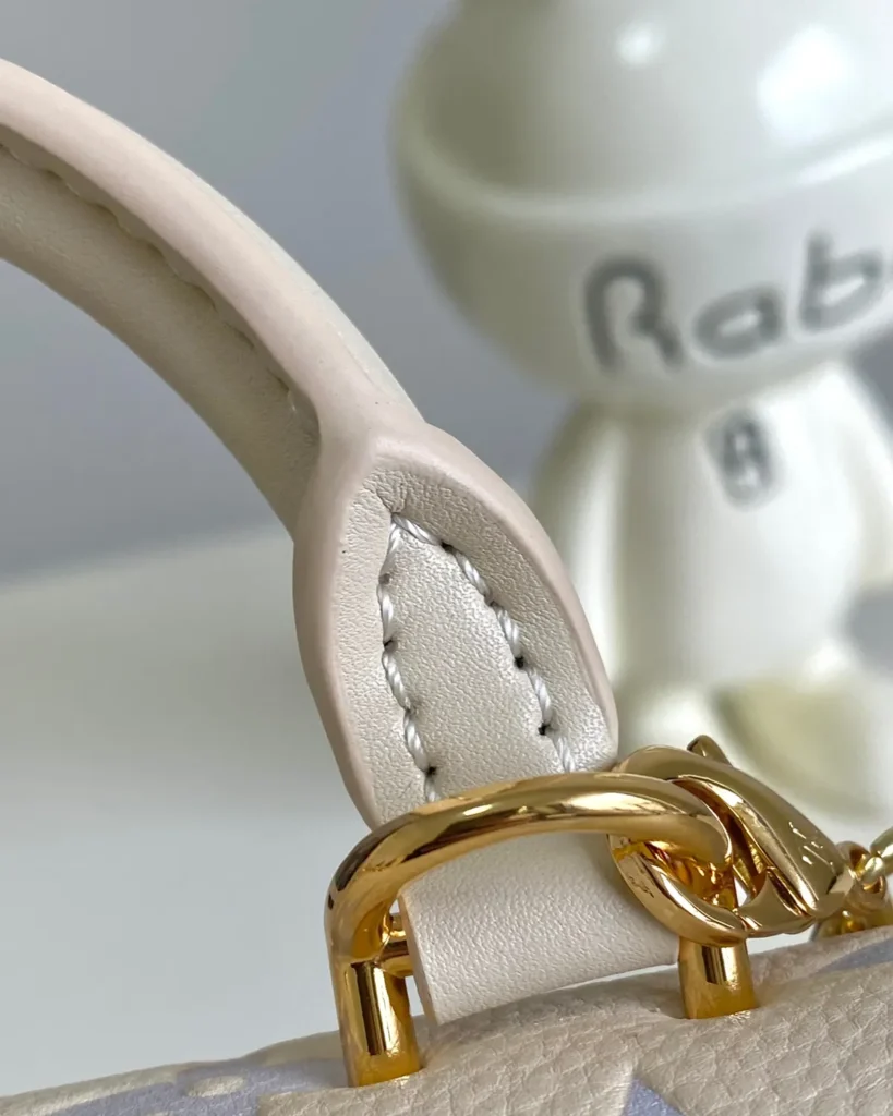 Cream Pastel Monogram Top Handle Bag — handle detail view