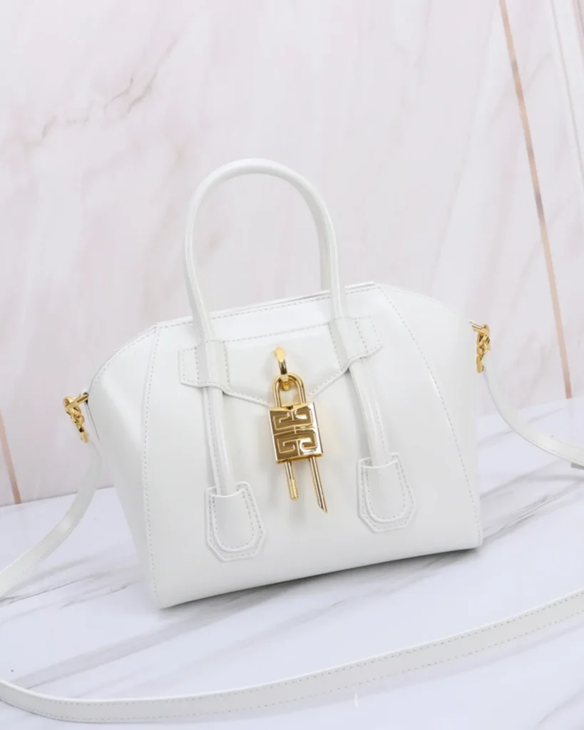White Lock Detail Top Handle Bag — front angle view