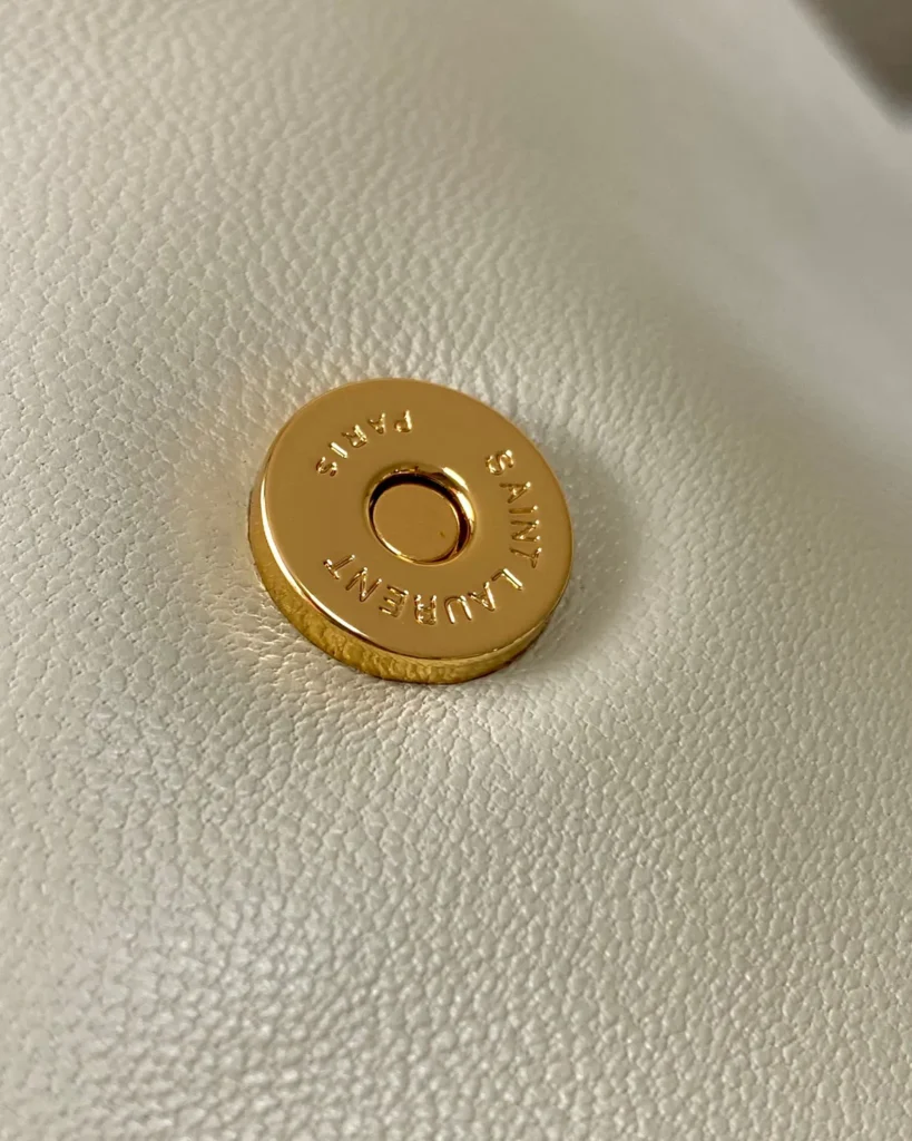 Ivory Padded Envelope Chain Bag — closure detail view