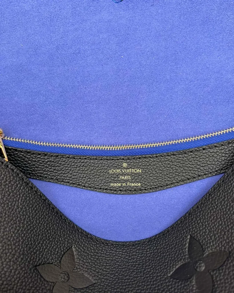 Black Embossed-Monogram Buckle Satchel — interior zip view