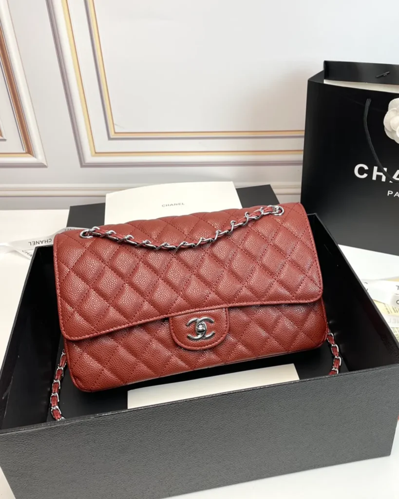 Rust Red Quilted Chain Flap Bag — front view