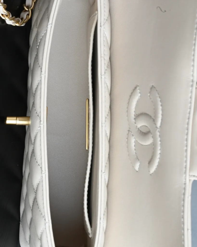 Pale Beige Quilted Top-Handle Flap Bag — open interior view