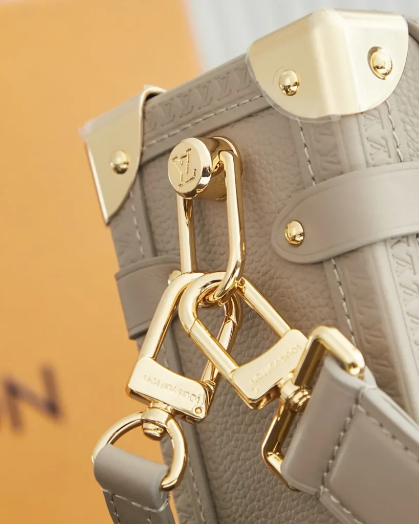 Taupe Corner-Plate Shoulder Bag — strap clip view