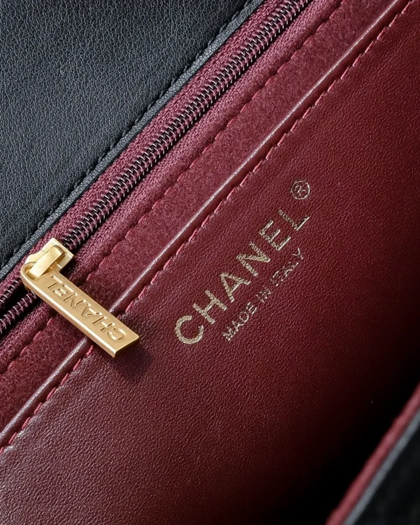 Black Quilted Top-Handle Flap Bag — lining detail view