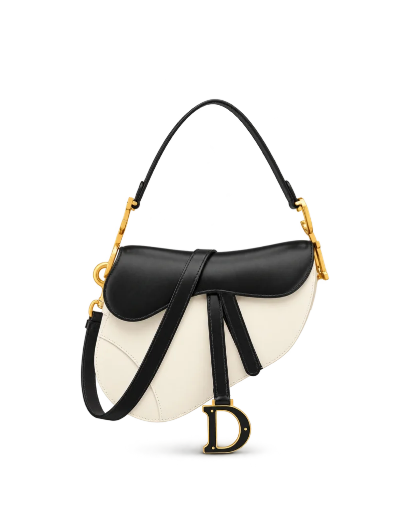 Cream and Black Asymmetric Saddle Bag — upright front view