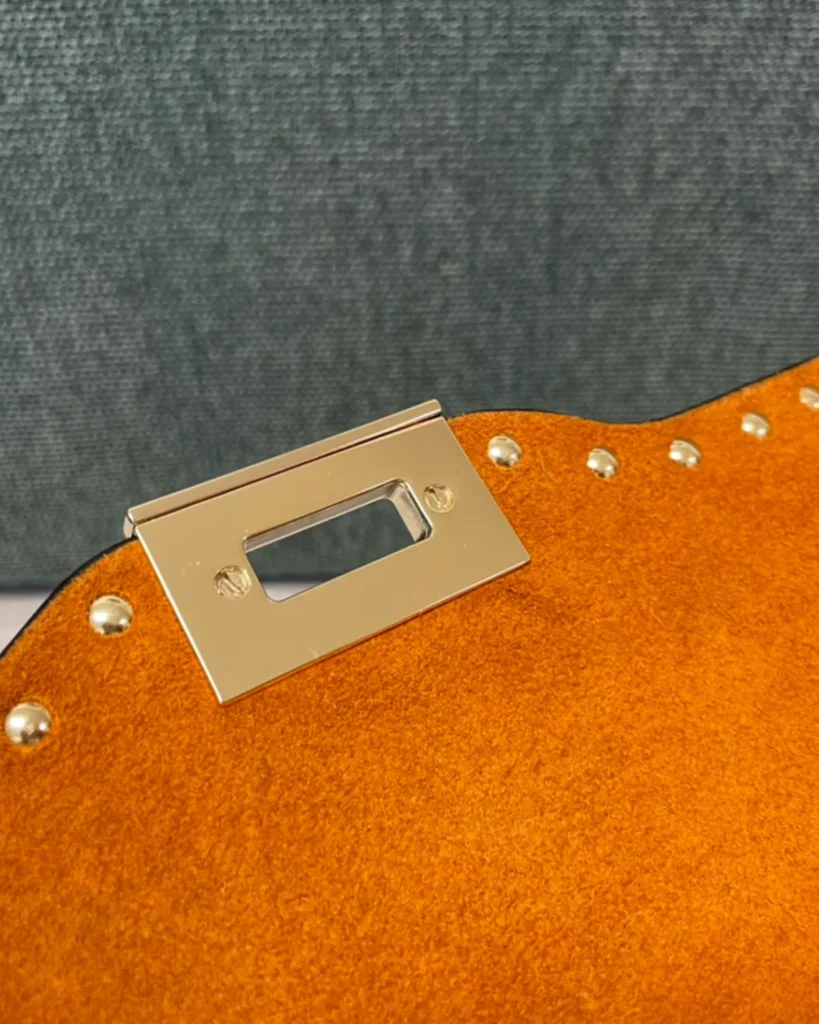 Tan Studded Edge Flap Shoulder Bag — flap detail view