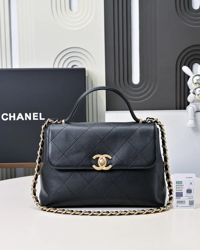 Black Quilted Top-Handle Flap Bag — front view