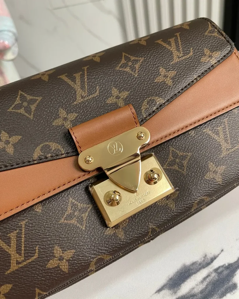 Brown Monogram Caramel Chain Flap Bag — clasp detail view