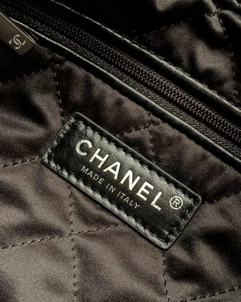 Glossy Black Quilted Gathered Tote — lining detail view