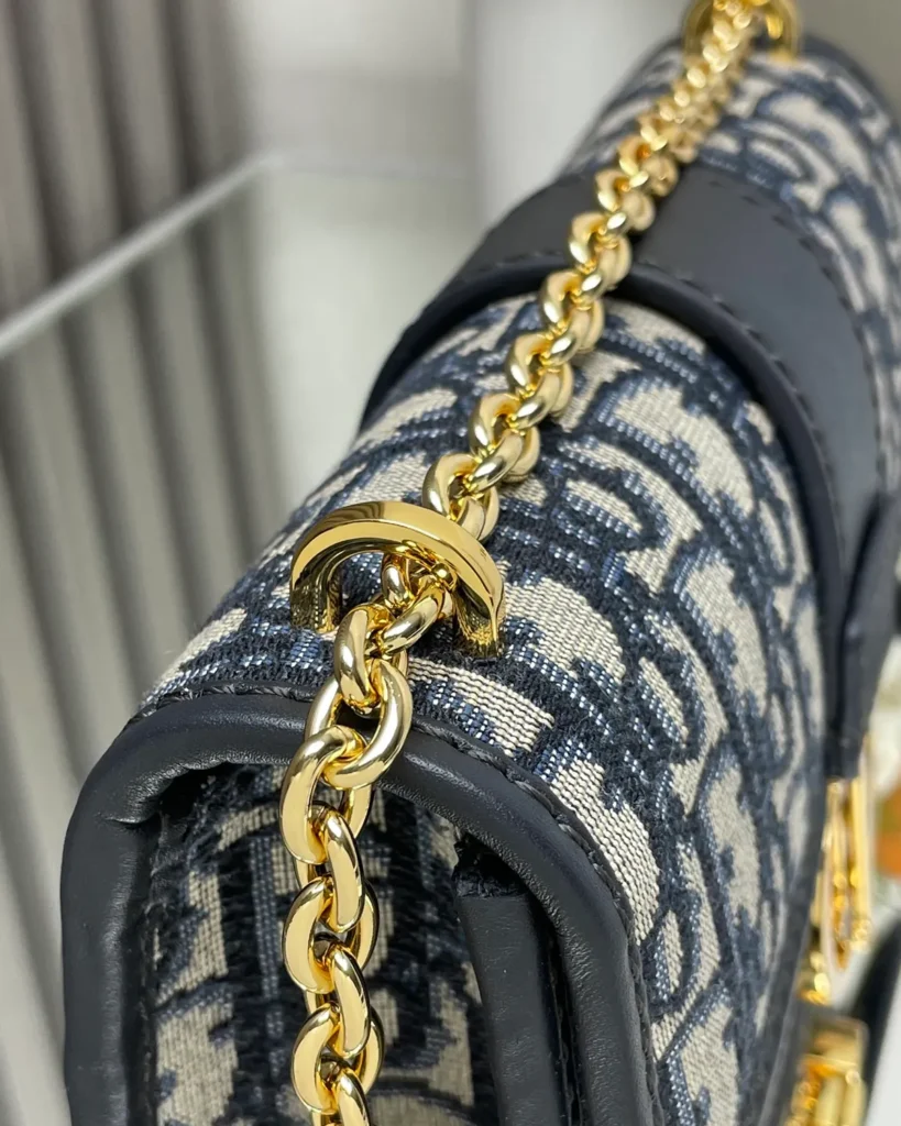 Navy Monogram Gold-Tone Chain Bag — chain detail view
