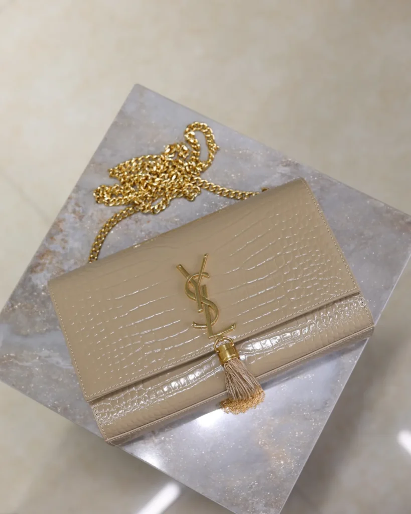 Taupe Embossed Tassel Chain Bag — chain overhead view