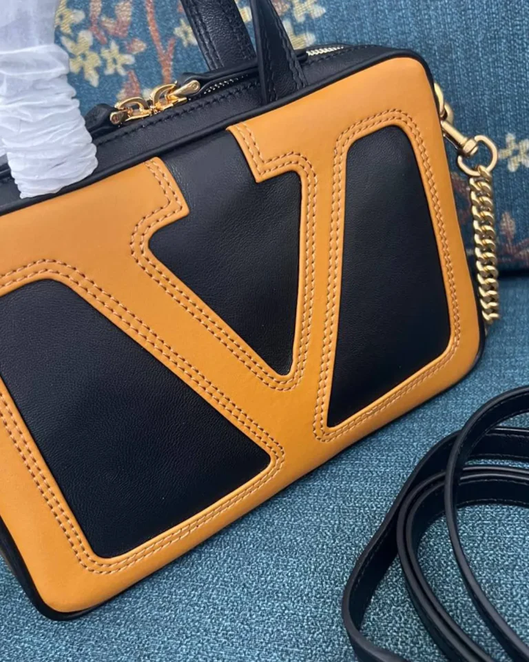 Black and Tan V-Panel Zip Top-Handle Bag — front detail view