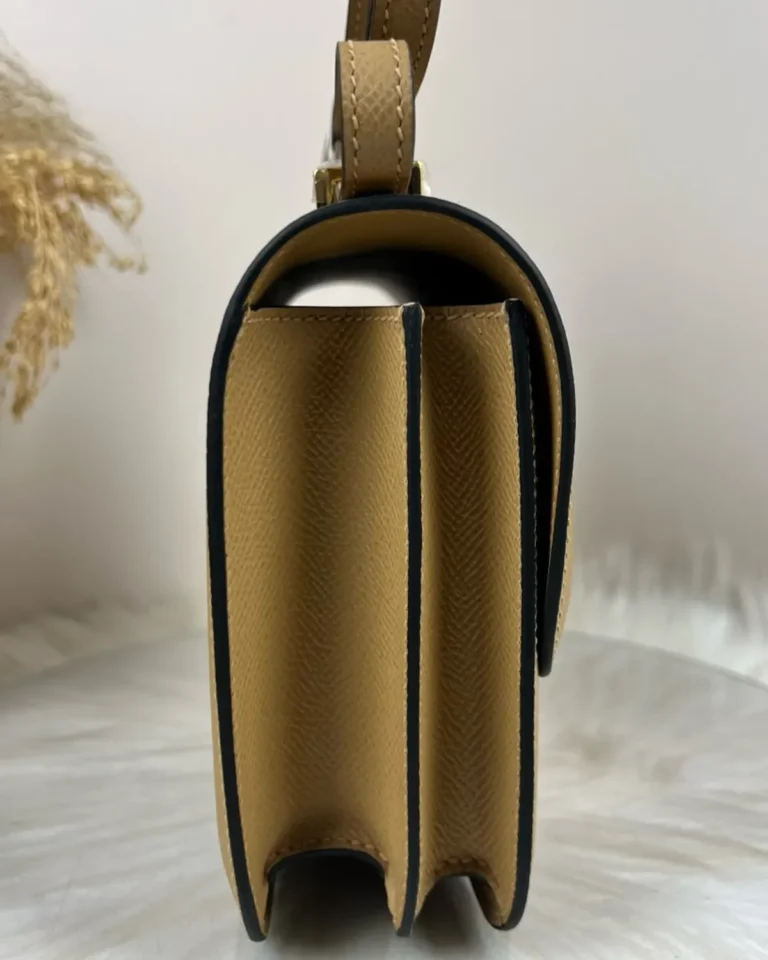 Kraft Tan constance-inspired mini 18 bag, side profile view