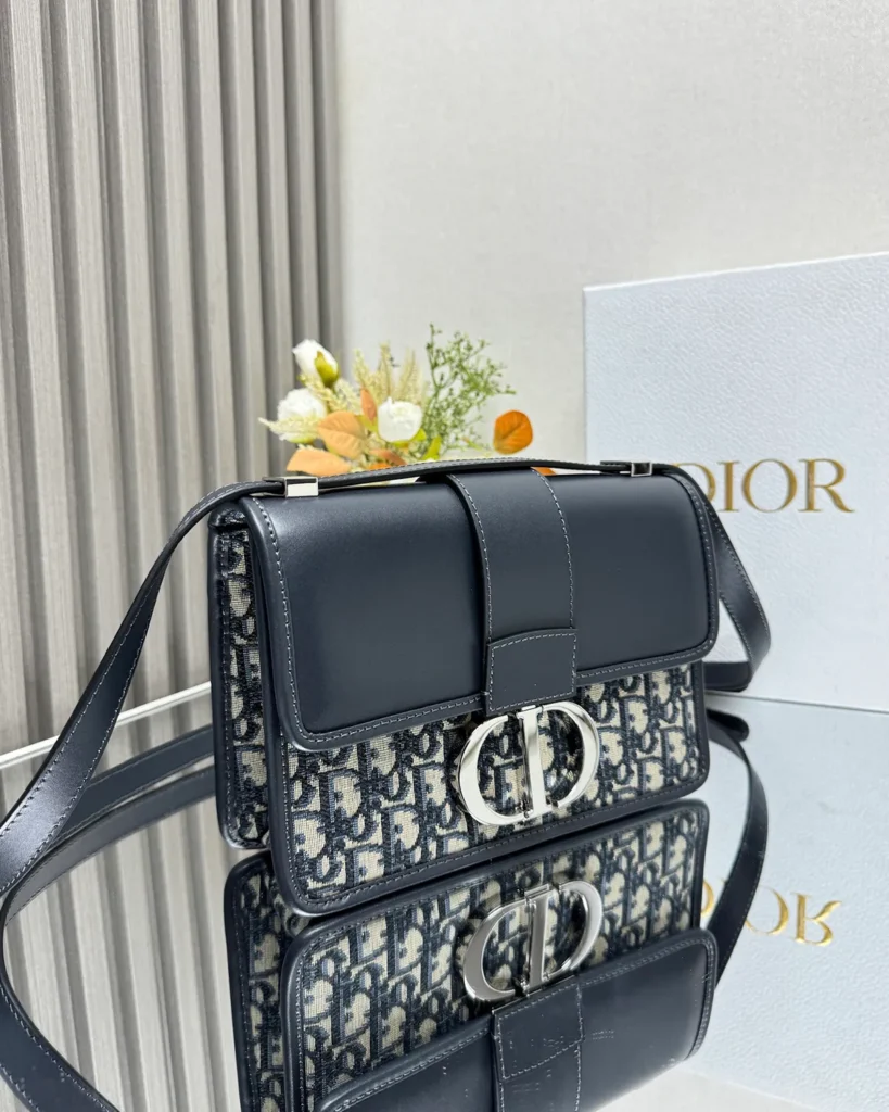 Navy Monogram Box Flap Bag — angled front view