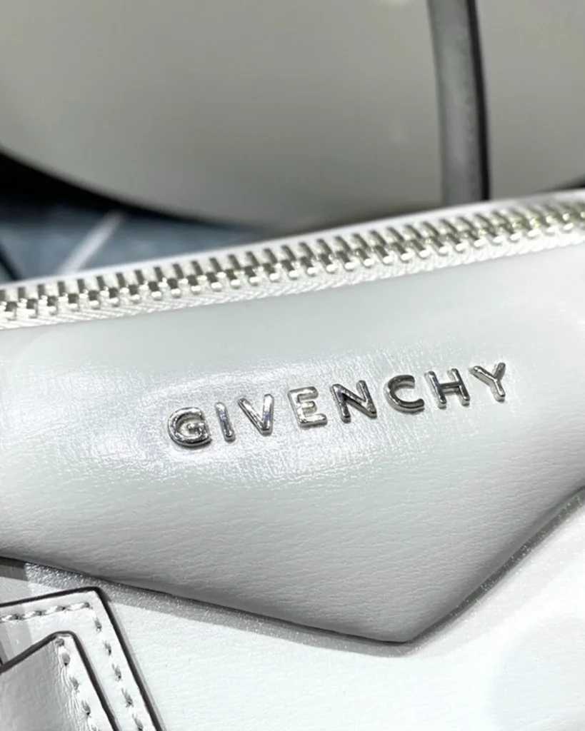 Pale Grey Architectural Top Handle Bag — logo detail view
