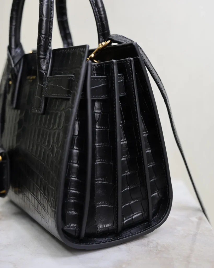 Black Embossed Accordion Tote — side view
