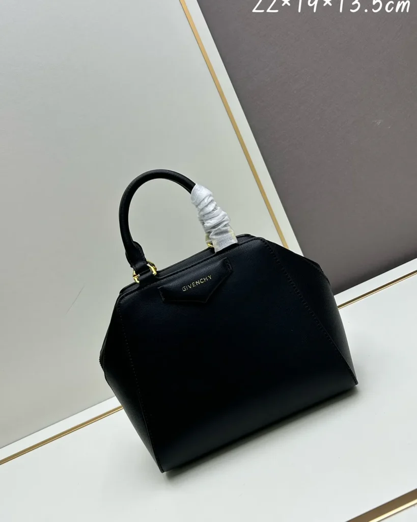 Black Domed Top Handle Bag — front angle view