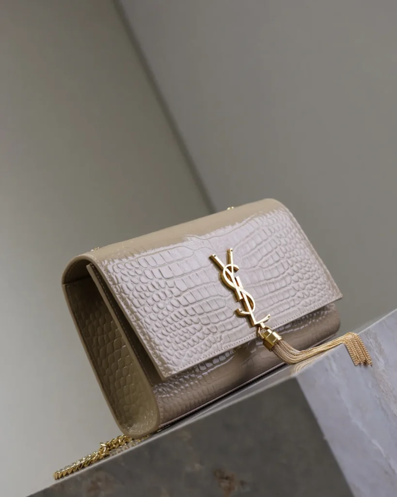 Taupe Embossed Tassel Chain Bag — three quarter view