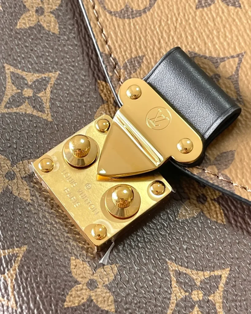 Two-Tone Monogram Envelope Satchel — clasp view