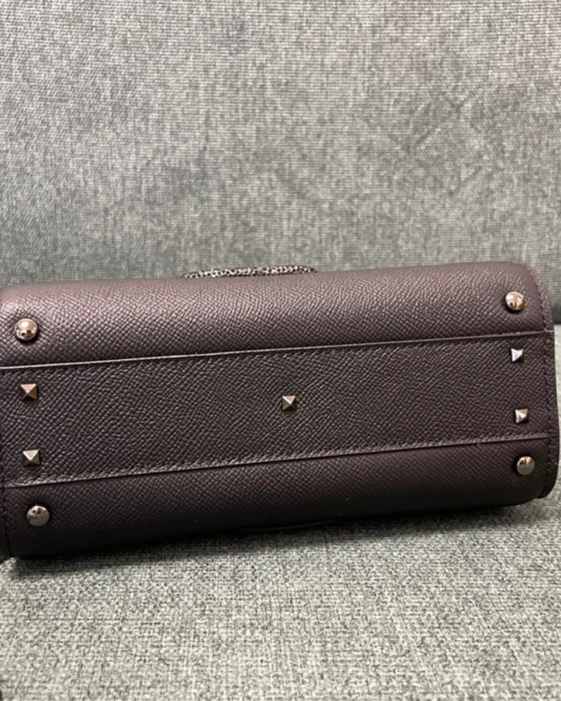 Dark Brown Embellished Emblem Top-Handle Bag — base view