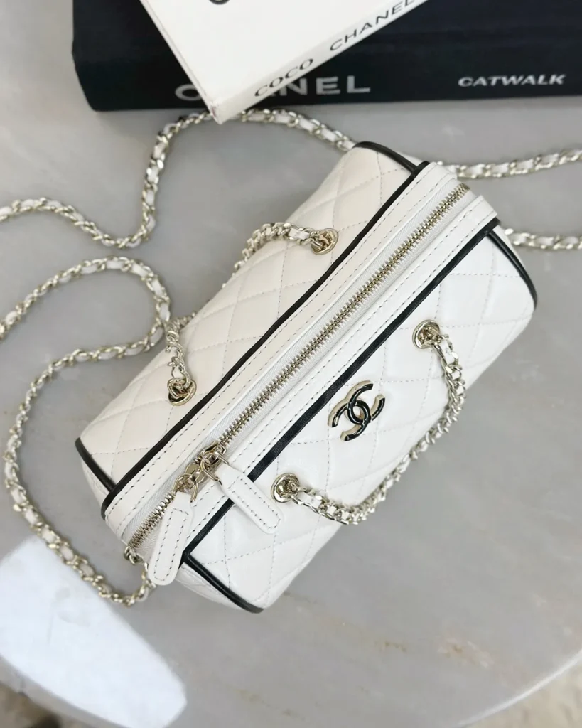 White and Black Quilted Chain Bowler Bag — top view