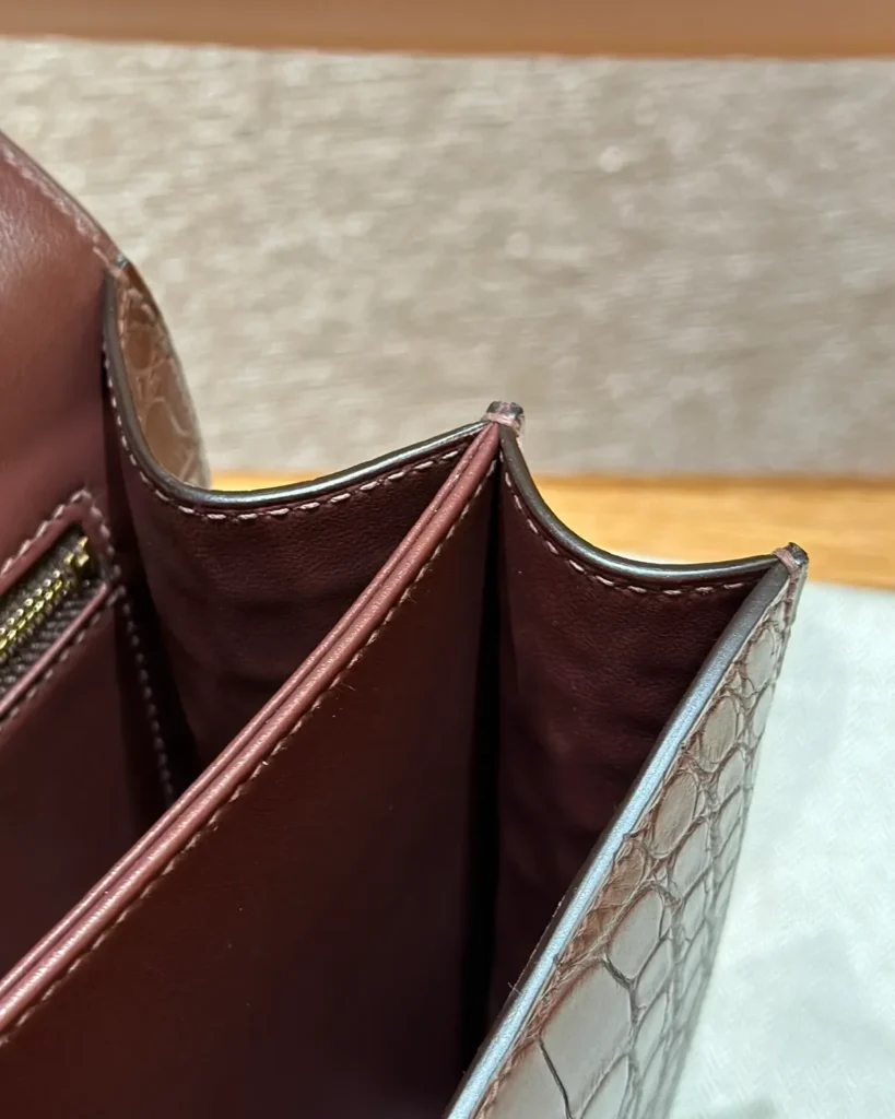 Top view of brown mini bag compartments and center divider